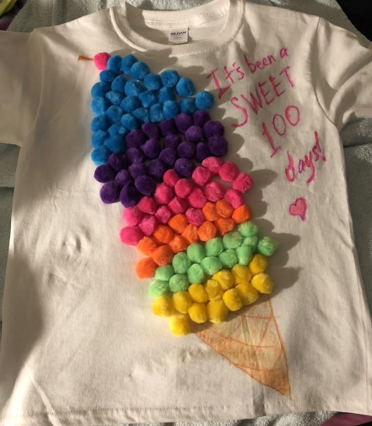100 days of school shirt with colorful pom poms