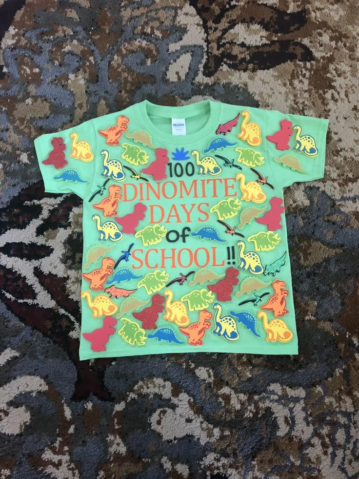 Boy Sporting Dinosaur 100th Day School Shirt
