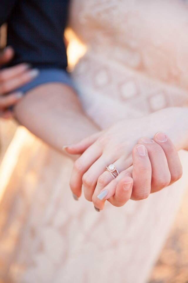 Couple holding hands wearing a love quote t-shirt