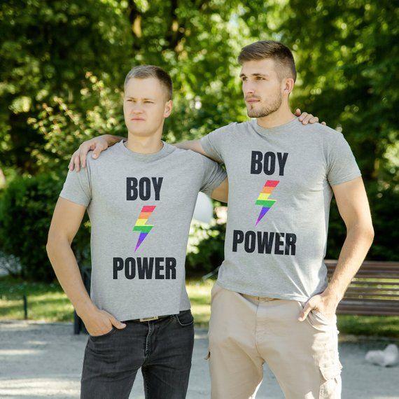 Couple Holding Hands Wearing Matching Love Quote T-Shirts