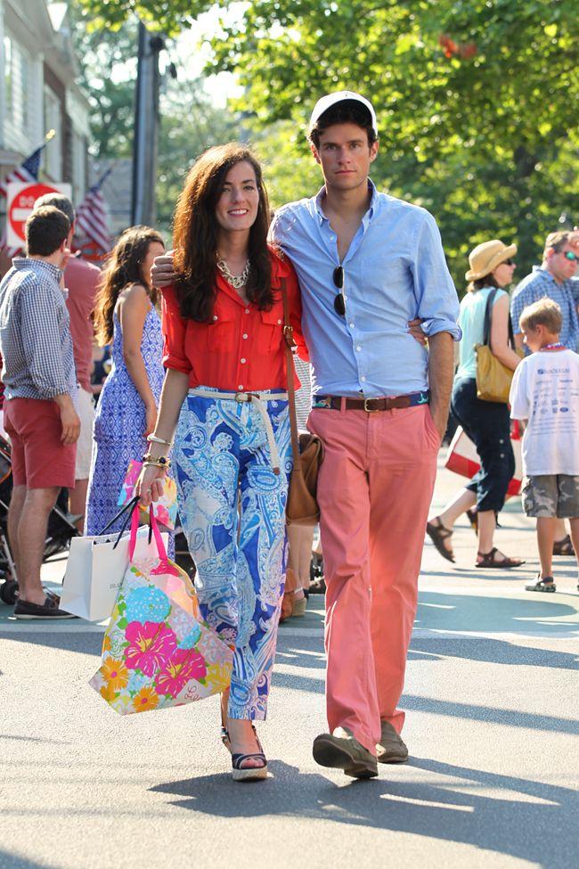 Couple wearing matching oversized 4th of July shirts
