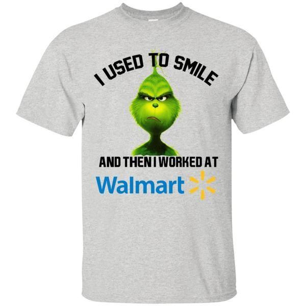 Dad and son matching Santa Claus Christmas shirts smiling