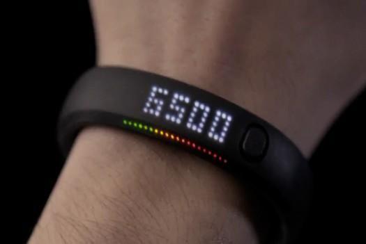 Smartwatch on a Man's Wrist, Displaying Fitness Data