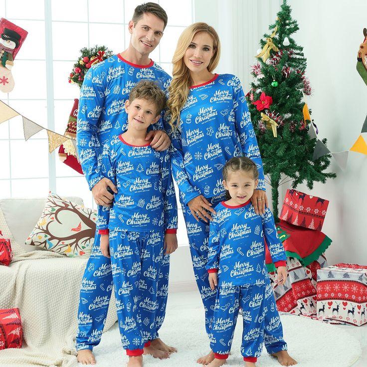 Family Wearing Matching Long Sleeve Christmas T-Shirts
