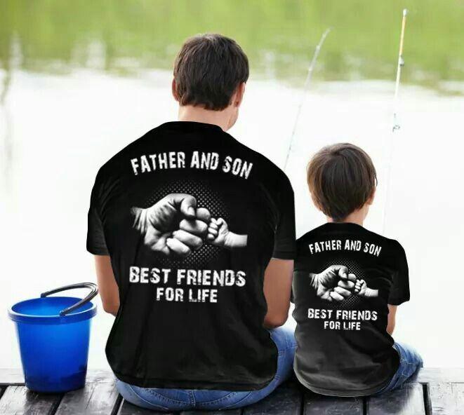Father and son wearing matching fishing shirts