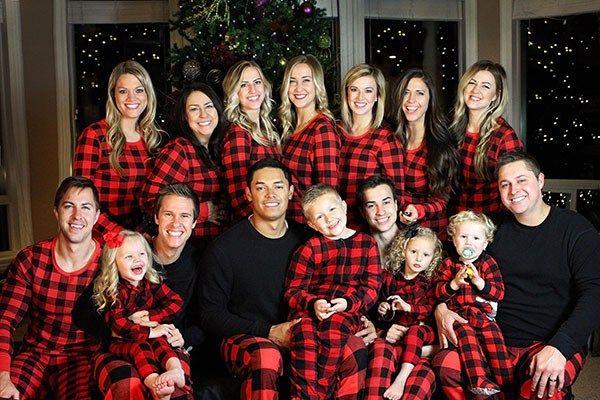 Family Wearing Funny Matching Christmas Pajamas
