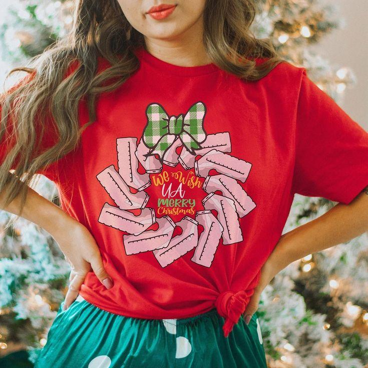 group of nurses wearing funny christmas shirts