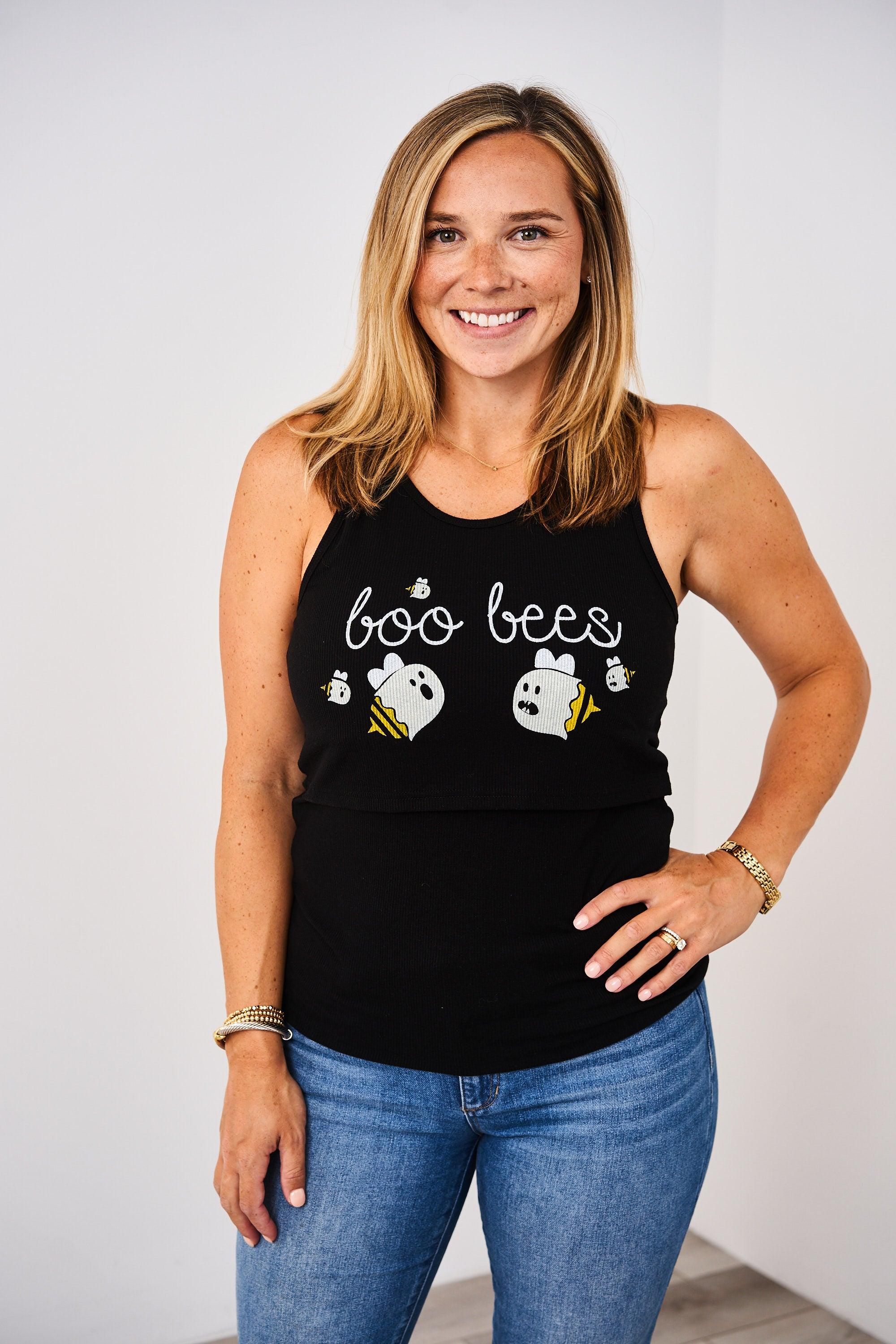 A group of mothers wearing different styles of boo bees nursing shirts