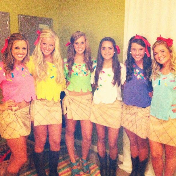 Group of friends wearing variety of adult alcohol halloween costumes at a party