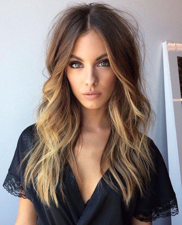 Hairdresser with long hair wearing stylish t-shirt