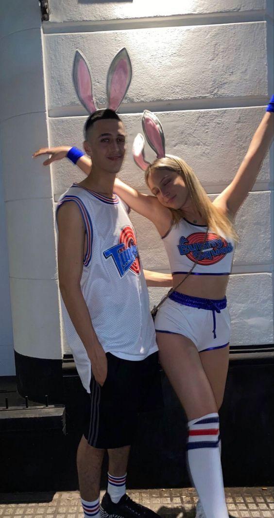 Couple wearing matching bunny easter shirts