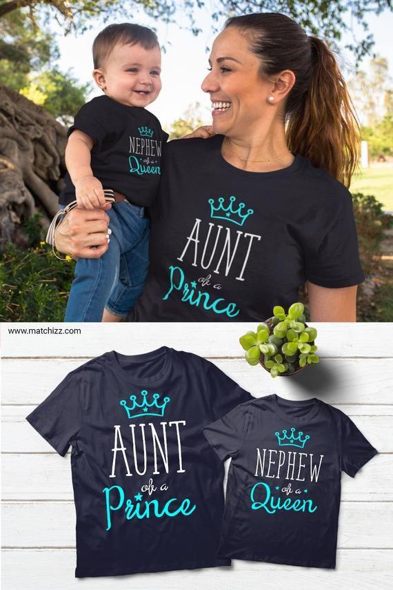 Mom and daughter wearing matching shirts with heart designs
