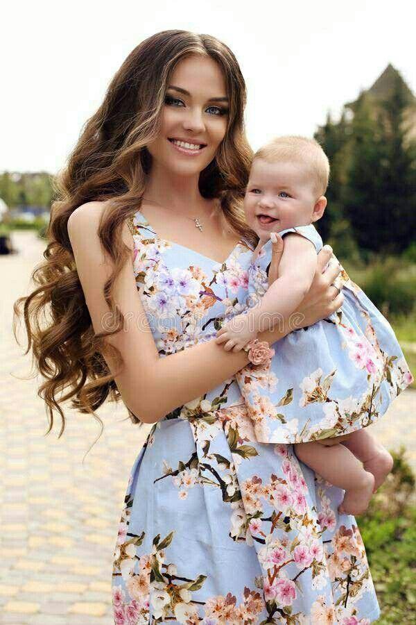 Mother and Daughter Matching Floral T-shirts Smiling