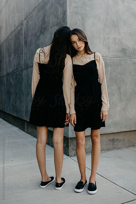 Two friends Posing in Matching Outfits