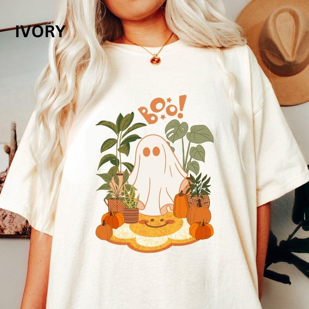 a collection of vintage halloween shirts