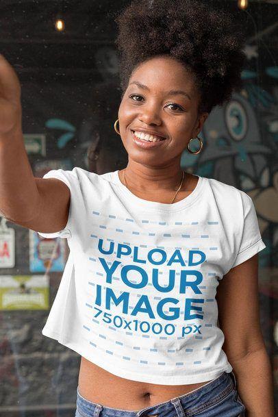 woman wearing love quote t shirt smiling