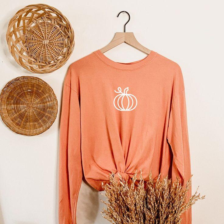 Woman wearing terracotta comfort color thanksgiving shirt pumpkin patch