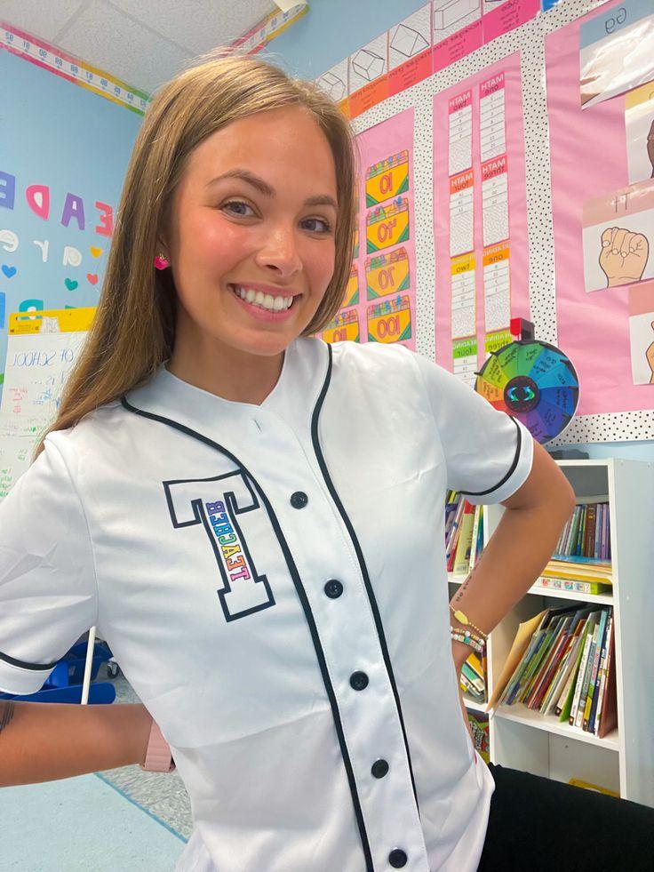 Teacher Wearing Embroidered Shirt in Classroom